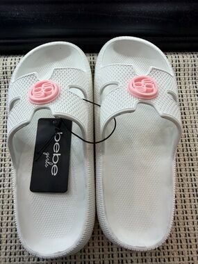 bebe White Slide Sandals with Pink Logo Medallion